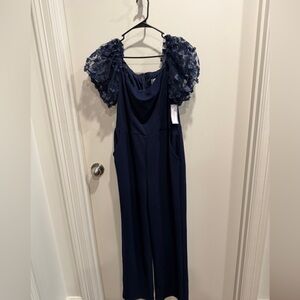 Premier Navy Jumpsuit with Floral Sleeves. NWT
